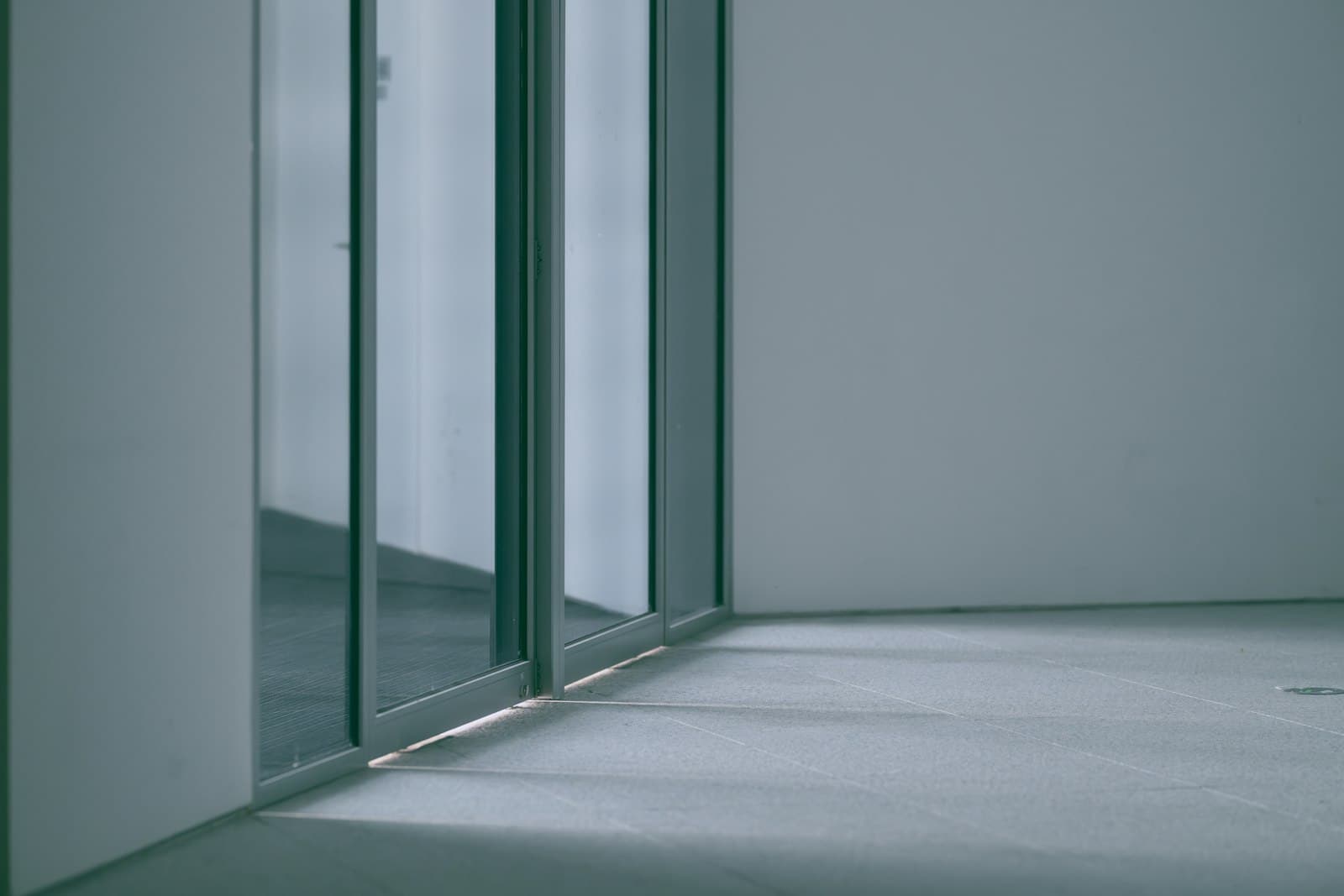Sliding glass door in an empty room