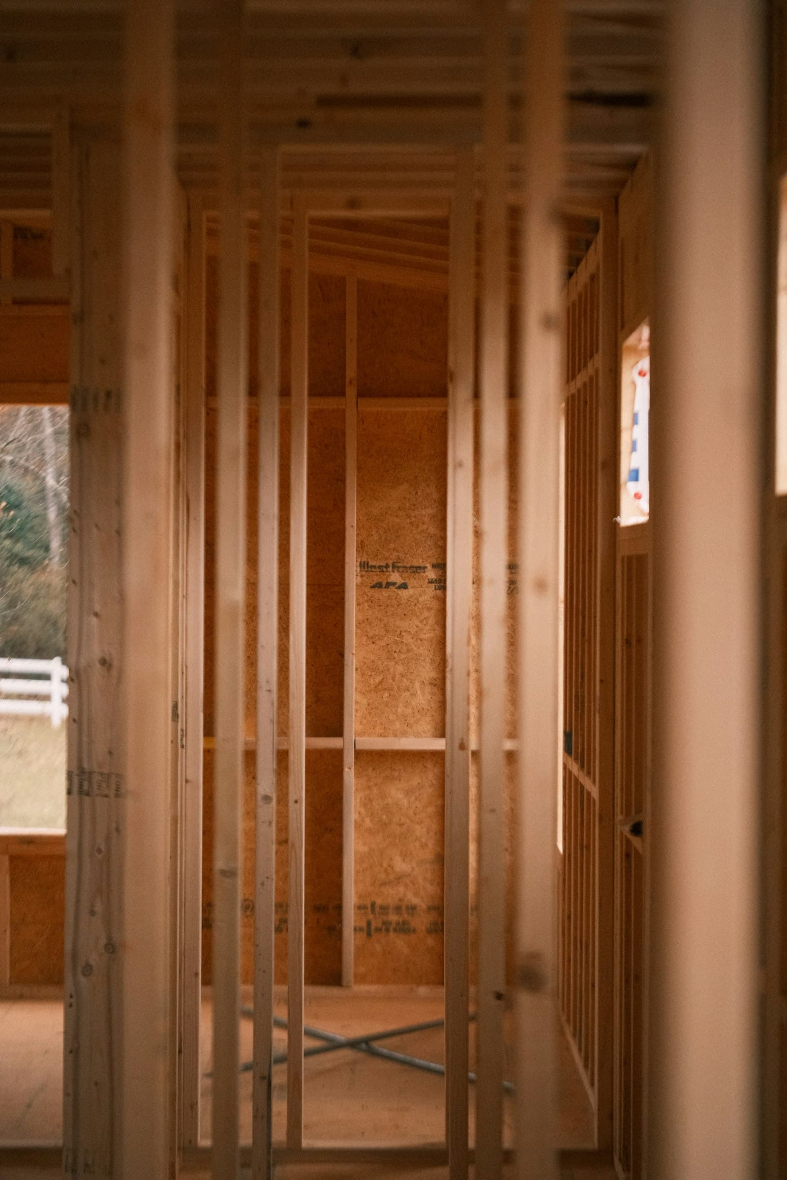 Room under construction with fresh wooden framing